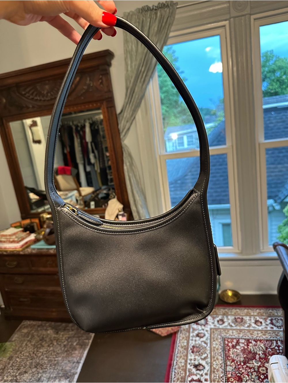 Coach Black curve zip bag with Smooth Leather Finish